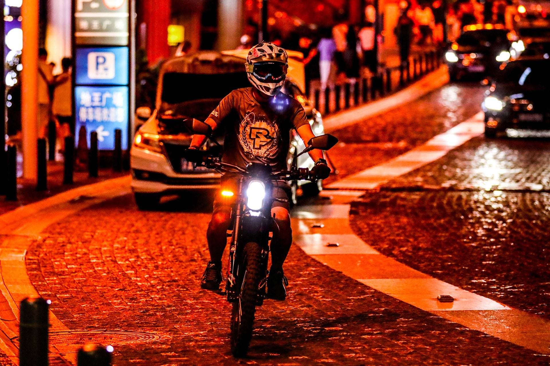 a man ride sur-ron dirt bike