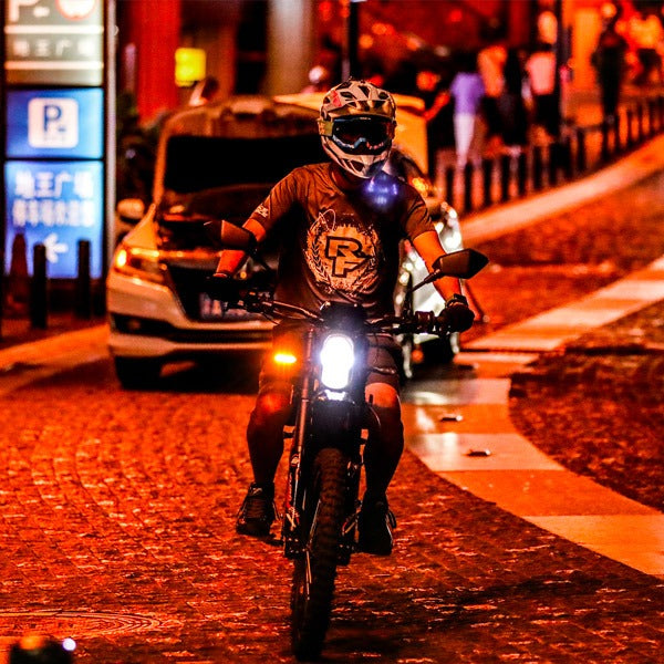 a man ride sur-ron pit bike