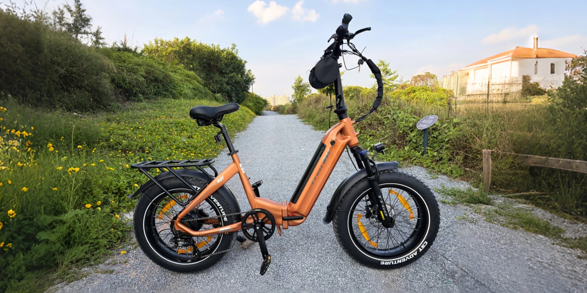 TTGO F6 Boost folding fat tire electric bike parked on a city street